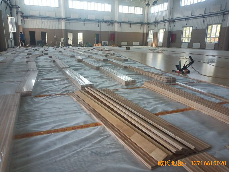新疆克拉玛依市独山子虹园小区体育馆体育地板施工案例
