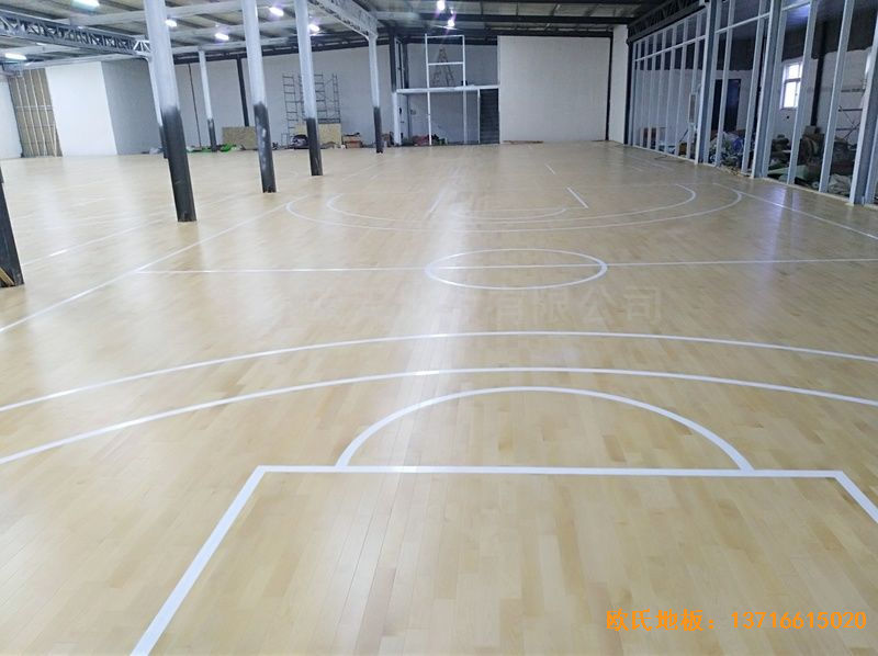 河南濮阳永康篮球训练中心体育木地板铺设案例