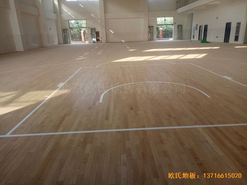 洛阳伊水小学篮球馆运动木地板铺设案例0
