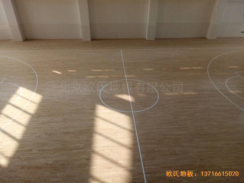 洛阳伊水小学篮球馆运动木地板铺设案例3
