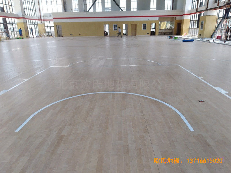 云南倪家营第三小学篮球馆体育地板安装案例0