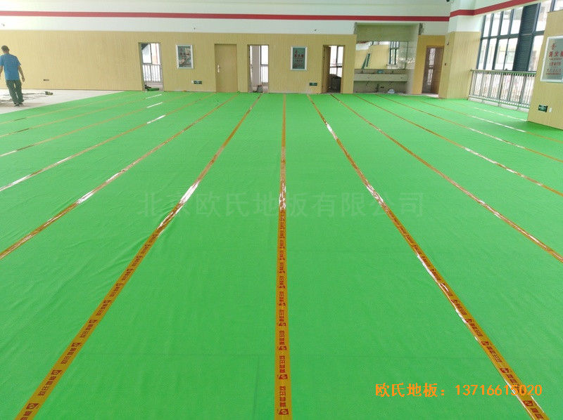 云南倪家营第三小学篮球馆体育地板安装案例2