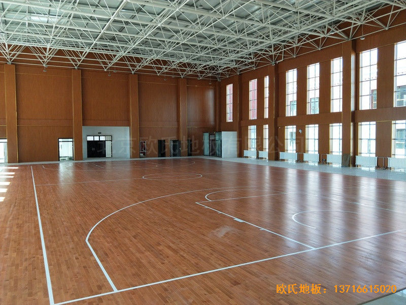 青海贵南县第三民族高中篮球馆体育地板铺设案例5